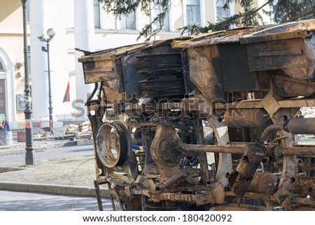 A burned-out car. Barricades in Kiev at the mass unrest during the political crisis in Ukraine. Kiev, 07.03.2014 year