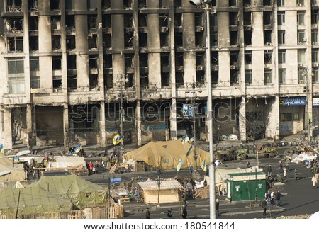 View of the independence square and burnt down the House of trade unions from the Instytutska Street, March 07, 2014.