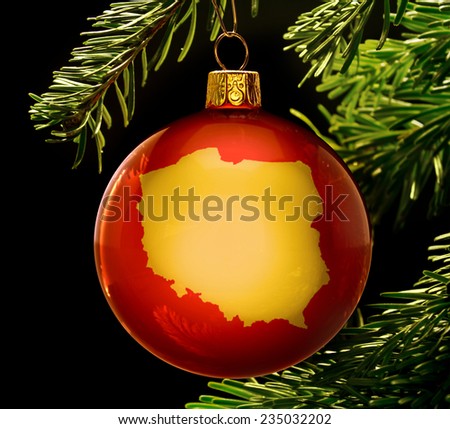 A red bauble with the golden shape of  Poland hanging on a christmas tree isolated on black.(series)