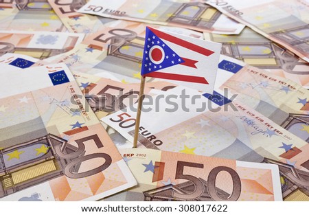 Flag of Ohio sticking in european banknotes.(series)