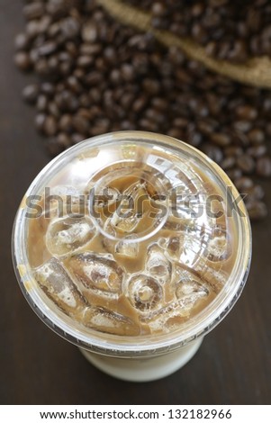 One Glass of Iced Coffee with coffee bean