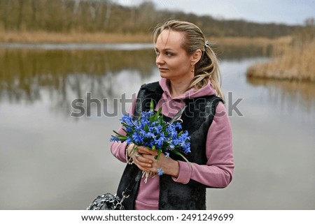 Similar – Image, Stock Photo Child picking spring flowers