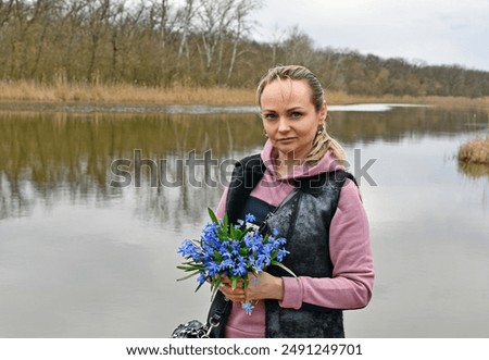 Similar – Image, Stock Photo Child picking spring flowers