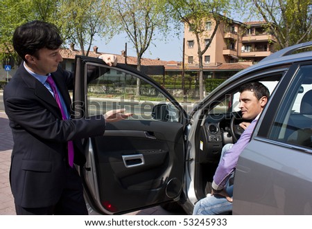 Car Salesperson and Prospect Customer
