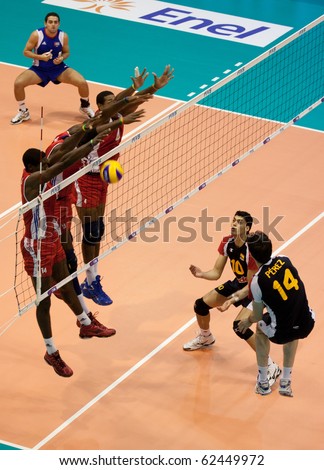 FLORENCE, ITALY - OCTOBER 5: spain player Ibn Perez spikes the ball at Volleyball World Championships  Spain vs Cuba at Nelson Mandela Forum in Florence on October 05, 2010