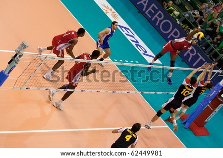 FLORENCE, ITALY - OCTOBER 5: cuban Joandy Leal Hidalgo spikes ball at Volleyball World Championships  Spain vs Cuba at Nelson Mandela Forum in Florence on October 05, 2010