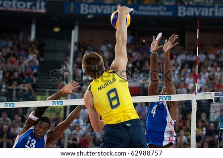 ROME, ITALY - OCTOBER 10: Brazil GLeandro Murilo Endres spikes ball at Volleyball World Championships  final match Brazil vs Cuba at Palalottomatica in Rome on October 10, 2010