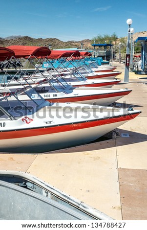 LAKE MEADE NATIONAL RECREATION AREA, ARIZONA, APRIL 3: Rental motorboats are ready and waiting for summer visitors to Lake Meade Recreation Area on April 3, 2013.
