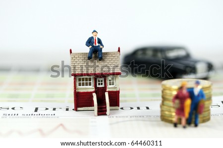 A couple with suitcases walking away from their house & mortgage after a bank has repossessed their house, with the bank manager sitting pretty on top of their house with his flash car parked nearby.