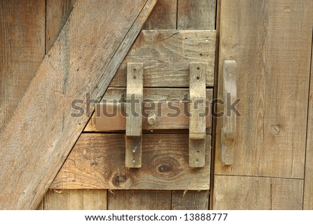 A hand crafted wooden door and latching mechanism