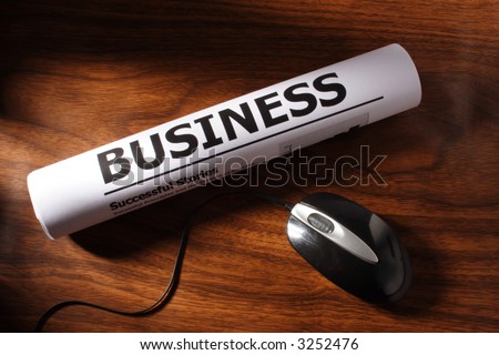 Still life of mouse and business file on table