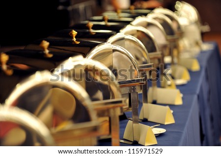 Many buffet heated trays ready for service.