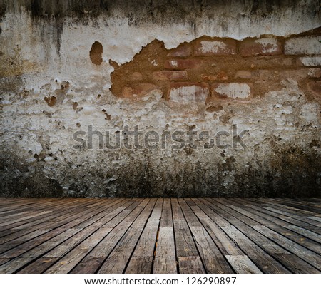 abstract the old wood floor and brick wall for background.