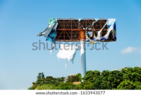 Similar – Image, Stock Photo Broken billboard on an ugly wall