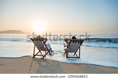 Similar – Image, Stock Photo Man and woman enjoying sunset in autumn mountains