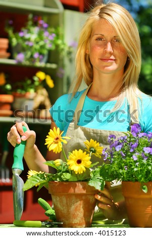 Attractive woman doing work in her garden