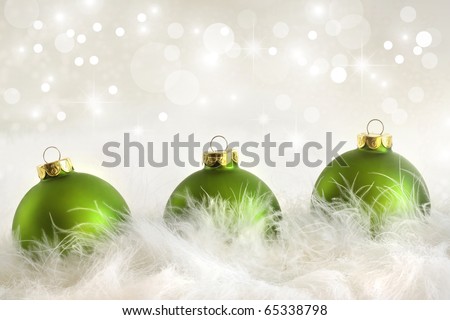 Green christmas balls with holiday background