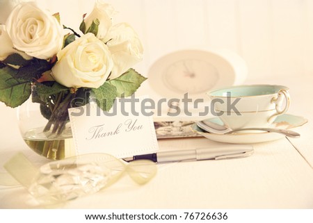 Thank you note on table with nostalgic romantic feel