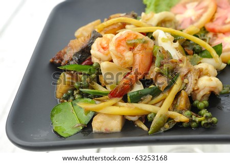 fried spicy seafood,shrimp,squid,fish and herb