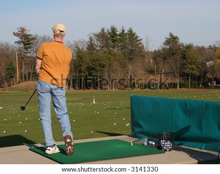 golfer at driving range