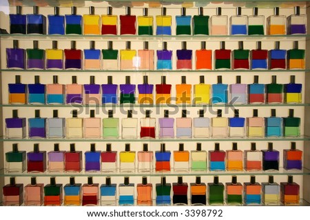 display of bottles with different colored liquids