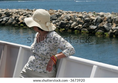 woman relaxing on boat