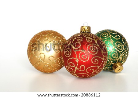 Three Beautiful Christmas Ornaments On White Background With Copy Space ...