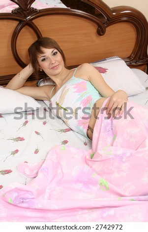 beautiful girl blonde has rest on bed bedroom in  underwear