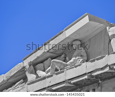 Parthenon, ancient greek temple detail, man laying down statue
