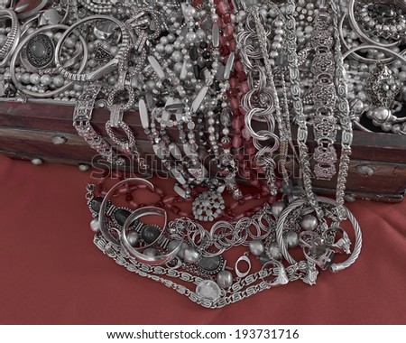 a feast of shiny jewelry , in b/w and red only
