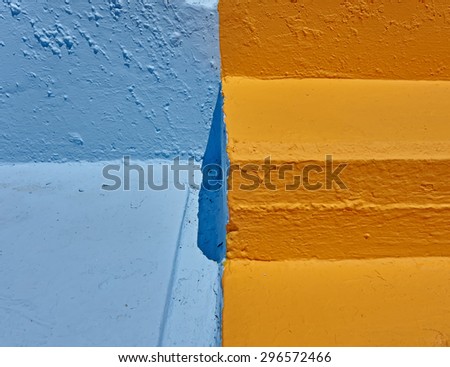 vibrant orange and blue rough surfaces close-up