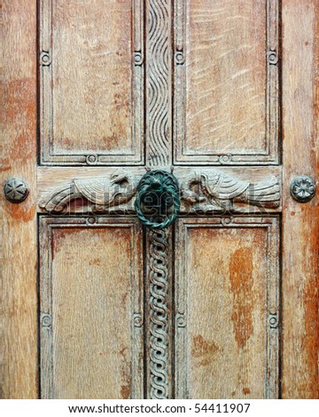 Antique door of medieval Greek church, detail