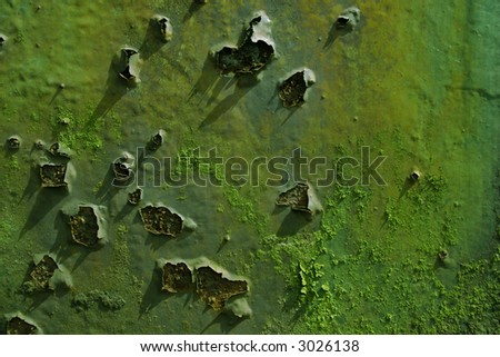 interesting rusting  and moulding texture worn out numbers on, captured form the side of an old rusting train carridge