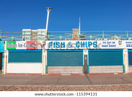 BRIGHTON, UK - FEBRUARY 8, 2011: Closed fish and chips shop on February 8, 2011 in Brighton, UK. Stores are closed over the winter there are few tourists.