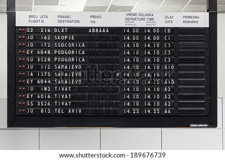 BELGRADE, SERBIA - FEBRUARY 18, 2014: Flight information display at Belgrade airport Nikola Tesla, the fastest growing major airport in Europe.