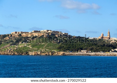 Sea view on Mgarr, small Maltese village surrounded with fertile agricultural land and vineyards.