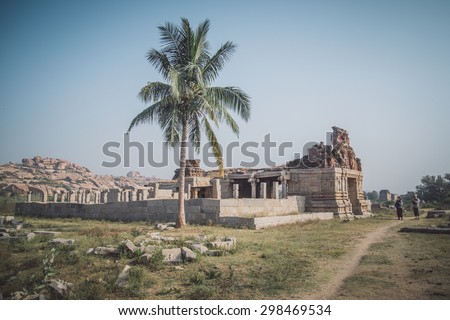 Ruins of Hampi are a UNESCO World Heritage Site. Post-processed with grain, texture and colour effect.