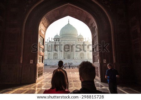 AGRA, INDIA - 28 FEBRUARY 2015: View of Taj Mahal from mosque with people. West side.