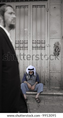jewish orthodox passing a sleeping old arab man