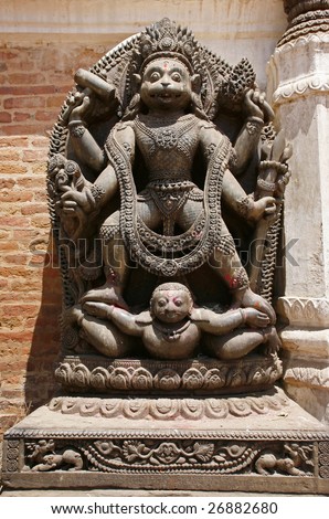 Wood carving of Hindu god Hanuman in temple in Bhaktapur in Nepal