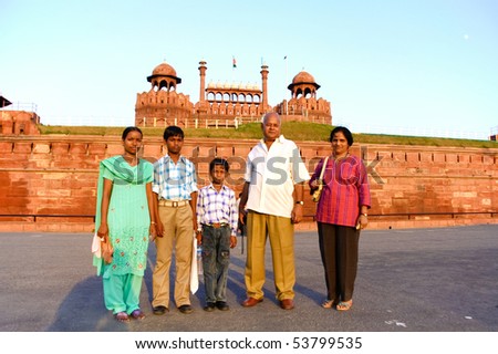 DELHI - SEP 22: Family visiting the Red Fort on September 2, 2007 in Delhi, India. It is the most visited tourist site in India after the Taj Mahal.