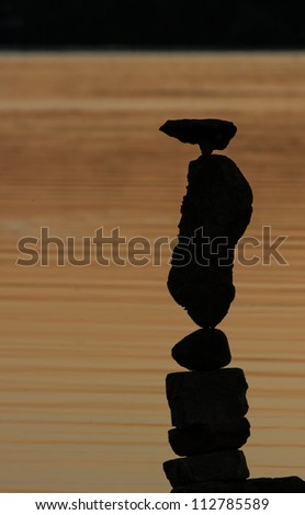 OTTAWA, CANADA - AUGUST 18: A piles of balanced stones at the International Stone Balance Festival at Remic Rapids and the Ottawa River on August 18, 2012 in Ottawa, Ontario.