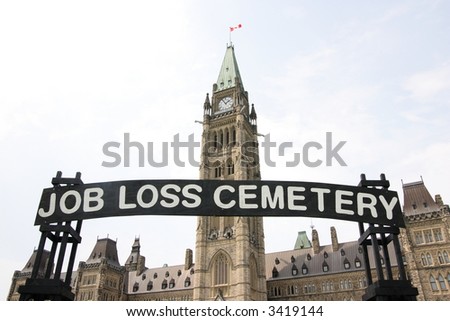 Sign at rally over Canadian job losses on Parliament Hill. Ottawa, Ontario. Canada.
