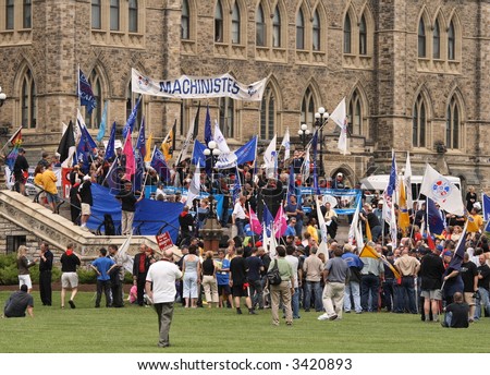 Rally over Canadian job losses. CAW president is in crowd. Parliament Hill. Ottawa, Ontario. Canada.