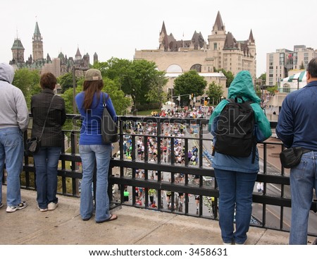People watching marathon from a bridge in downtown Ottawa, Ontario. Canada.