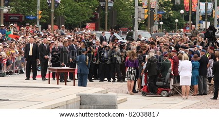 OTTAWA, CANADA - JUNE 30: William and Kate greeting war veterans at the National War Memorial in downtown Ottawa on June 30, 2011 during the first stop of their royal tour of Canada.