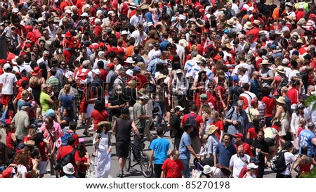 OTTAWA, CANADA – JULY 1: People crowd the streets during Canada Day on July 1, 2011 in downtown Ottawa, Ontario. Canada Day is celebrated annually and is a national holiday.