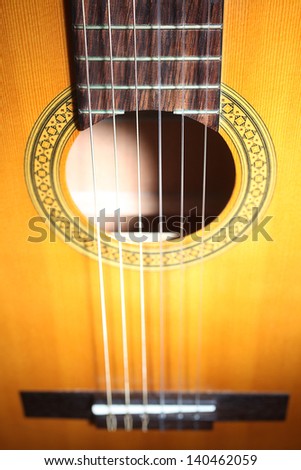Acoustic guitar strings. Classical musical instrument details close-up
