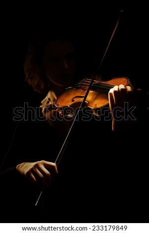 Violin player violinist. Orchestra musical instruments. Classical music playing isolated on black