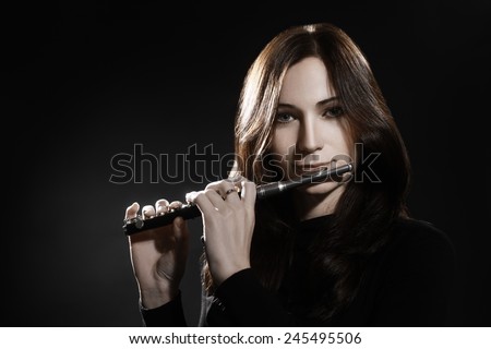 Flute piccolo Woman playing flute music instrument